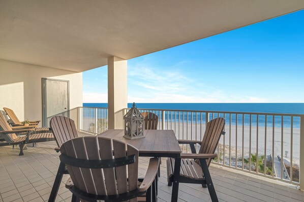 Coastal-inspired decor enhances this peaceful reading or relaxation spot, with the allure of the ocean just steps away.