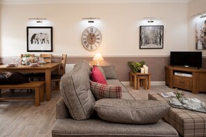 School View - the sitting room is perfect for some relaxation time in front of the TV