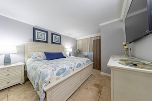 Main bedroom with a king size bed.