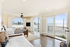 Primary bedroom features a king bed & a twin trundle.