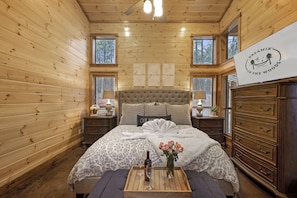 The master bedroom is inviting for every guest to sleep comfortably.