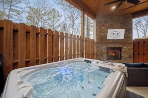 The hot tub is the most relaxing part of the cabin, set off the master room!