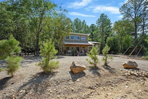 Beautiful Pine trees surround the cabin! 