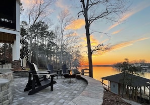 Patio with firepit. Incredible spot to catch sunset!