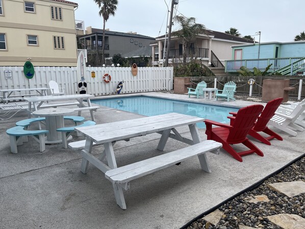 outside patio with a pool, great for family get together.