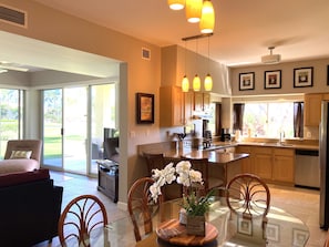 Overlooking the dining room, kitchen and peaceful lanai