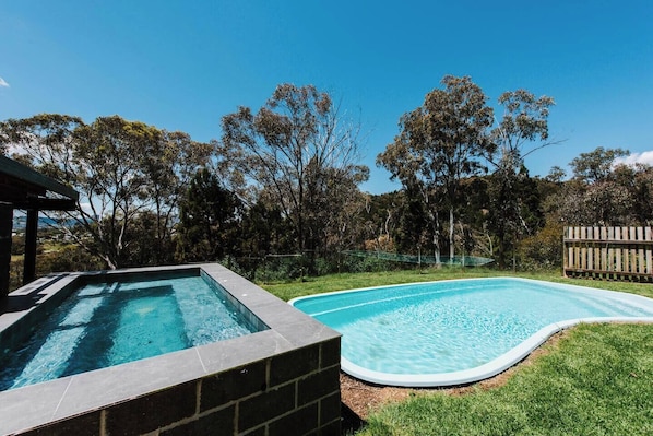 The private swimming pool is set amongst a stunning bush backdrop.