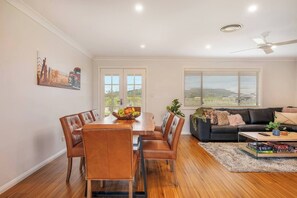 Open plan living and dining creates a comfortable space for groups to come together.