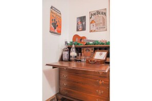 Serve UP! Antique desk can be used as a mini-bar, buffet, or desk.