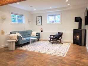 Living Room with gas fireplace & 50" TV