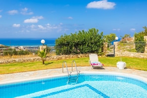 Private pool, terrace, and garden with sea views