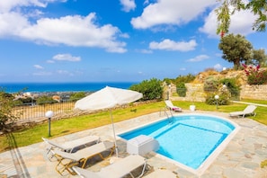 Private pool, terrace, and garden with sea views