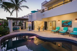 Patio with pool and view