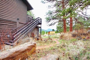 Side of cabin with stairs to deck