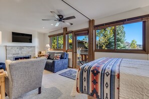 Queen bed with collapsible wall