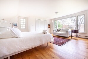 Spacious master bedroom with ample natural light