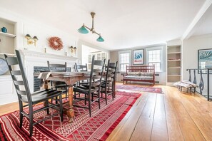 Dining area with decorative fireplace and sitting area