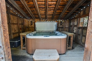 Hot tub with fairy lights for a magical evening soak!