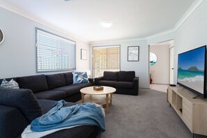 Main loungeroom with Smart TV and Foxtel.
