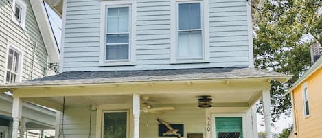 Cozy Cottage in summer.  Porch swing, of course!