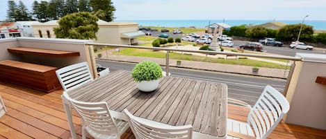 Upstairs outdoor balcony, table and benches