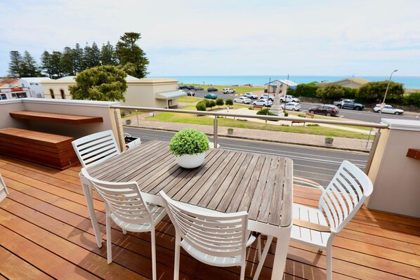 Upstairs outdoor balcony, table and benches