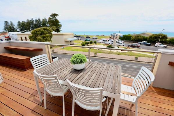 Upstairs outdoor balcony, table and benches