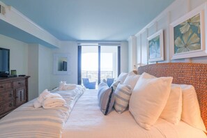 The master bedroom has incredible ocean views and sliding door access to the balcony.