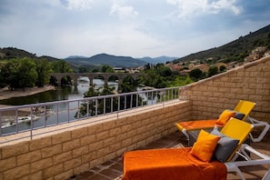 Terrace off top bedroom with fantastic views of the river orb and the mountains