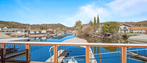 Large fully enclosed deck with views of the water and vineyards. 