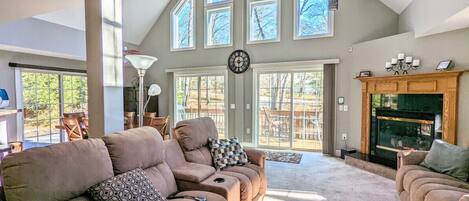 Welcome to the Chalet on Chalet! Beautiful living space with tons of natural light, wrap around deck for entertainment, fire pit (and firetable!) and beach/lake access!