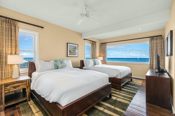 Bedroom 3 with 2 Queen beds and ocean view! - 2 Queen beds with luxurious linens, light down comforter (down alternative available upon request), SMART TV and ceiling fan.