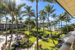 Ocean and beach view lanai! - with dining table, chaise lounge and end table!