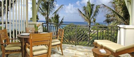 Ocean and beach view lanai! - Watch the whales breach from your lanai! There is a dining table with 4 chairs, a chaise lounge, and a side table