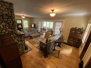 Living area with ample seating and fireplace 