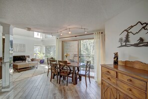 New flooring throughout the condo is chic and modern.