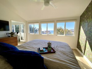 Coffee in bed, & watch the surfers, crashing waves, pelicans & dolphin pass by!