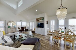 Shiplap walls, comfortable seating, vaulted ceiling, large screen TV - About The View has the space to relax