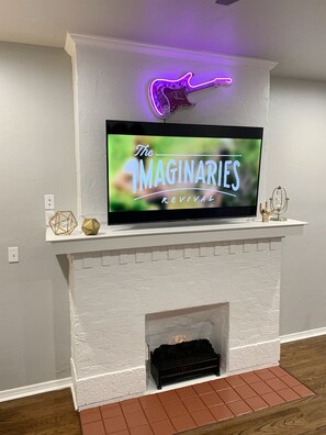 Mantle w/ Smart TV and Decor