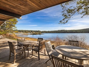 Relax on this deck just above the waters edge