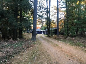 Off the road in a peaceful wooded setting.