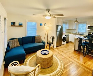 View of living area & open concept space from entry area