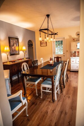 Our dining room includes a large Farmhouse table for serving breakfast. 