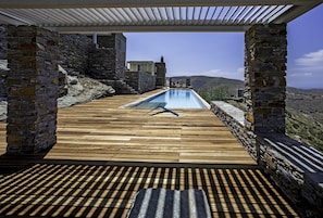 The large deck area around the pool