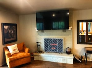 70” t.v and electric logs in the fireplace for everyone to enjoy.  