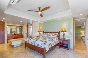 Enjoy the beautiful lanai and grounds of the Palms at Wailea with this elegant vaulted ceiling two bedroom two bath condominium in north Wailea.