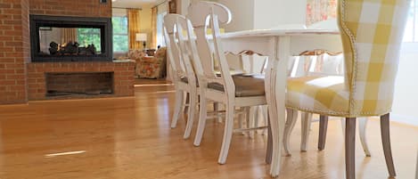 Breakfast Nook: The hub of the household with a window-side table and stools.