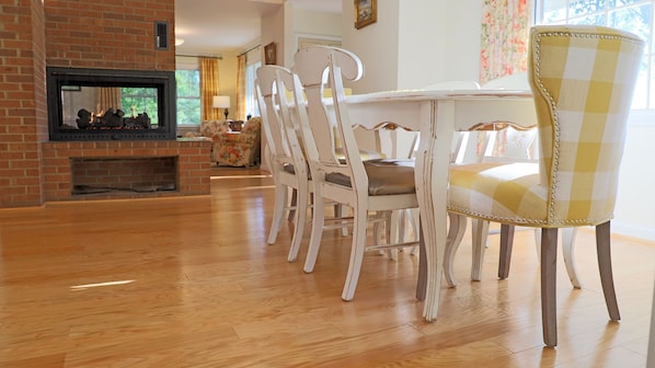 Breakfast Nook: The hub of the household with a window-side table and stools.