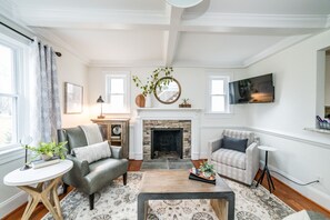 Living room w/ Roku TV & sleeper sofa