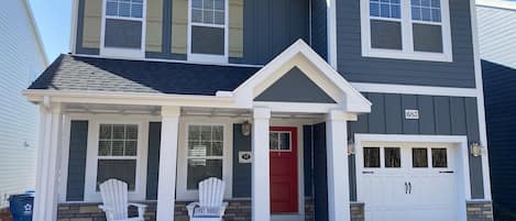 Front of house with our New Adirondack chairs! 